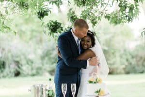 Latashia and Michael hugging at their wedding in Las Vegas.